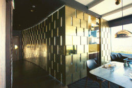 Metalier liquid metal brass walls: The Sugar Club, Auckland Sky Tower