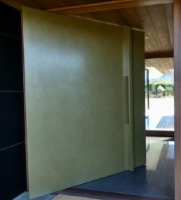 Metalier brass moonrock; open door; pivot door; liquid metal veneer