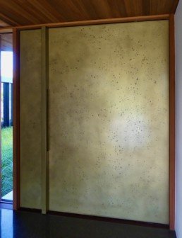 Metalier brass moonrock; open door; pivot door; liquid metal veneer
