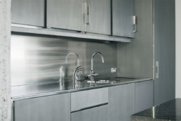 silver kitchen, minimalist design, liquid metal, metal veneer