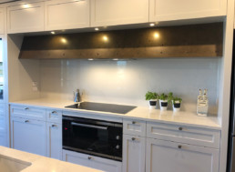 Smoky bronze rangehood, metal veneer, liquid metal