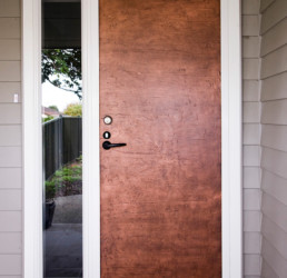 Copper entrance door, metal veneer, liquid metal