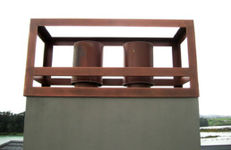 Copper chimney, copper chimney surrounds, aged copper, liquid metal, metal veneer