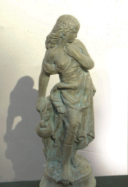 Bronze statue, aged, patina, liquid metal, metal veneer
