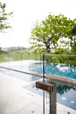 Bronze pool fence, liquid metal, metal veneer