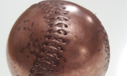 Metalier liquid metal copper on a baseball