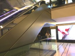 Escalator in Harrods: Metalier liquid metal; champagne gold