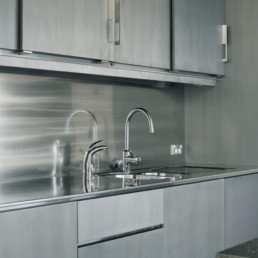 Metalier silver liquid metal in a kitchen bar