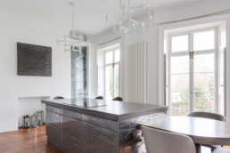 Liquid metal gunmetal & bronze texture; metal veneer; luxury finishes , luxury kitchen; designer kitchen: kitchen island; gunmetal bronze; bronze; metal veneers; decorative metal coating