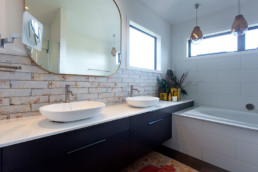 Gunmetal; gunmetal door fronts; bathroom vanity; liquid metal; metal veneer
