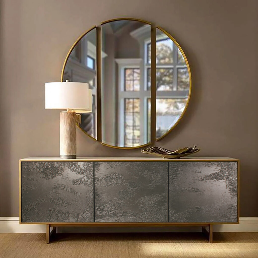 Metalier liquid metal gunmetal textured credenza with a gold trim in a luxury residential living area – India