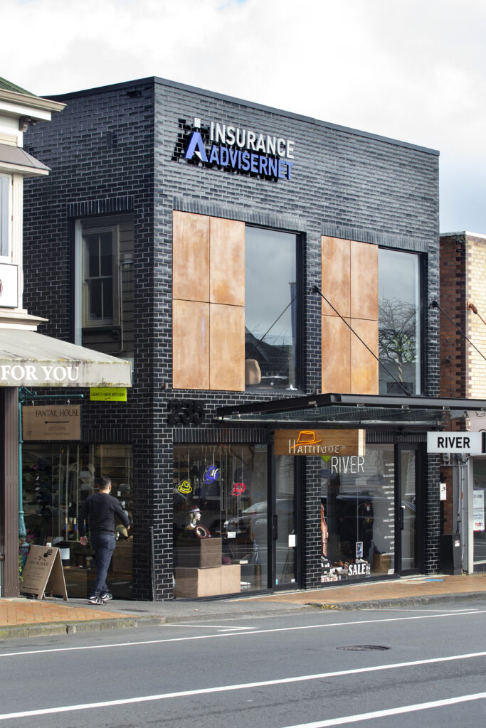 Bespoke copper Metalier liquid metal exterior cladding on a contemporary commercial property — England.