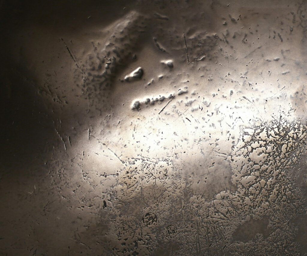 Decorative liquid metal finish showing real metaltexture, depth and surface variation