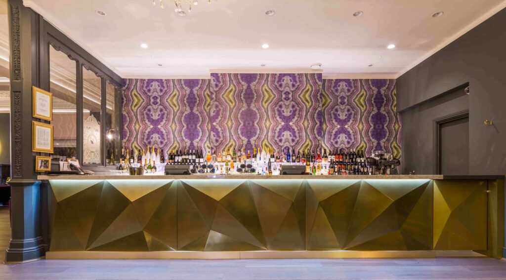 Metalier brass liquid metal bar front at the Grand Leicester Hotel