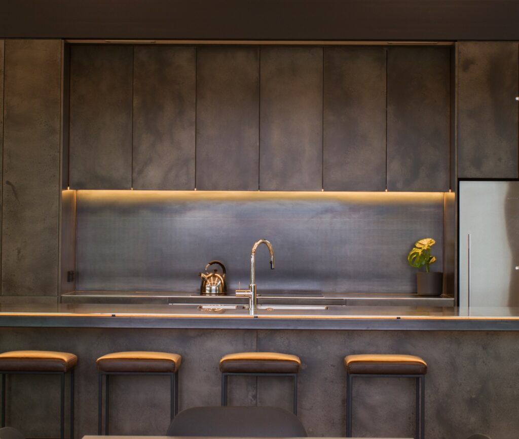 Patinated nickel silver Metalier kitchen with dark aged finish